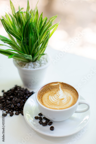 cup of coffee with beans