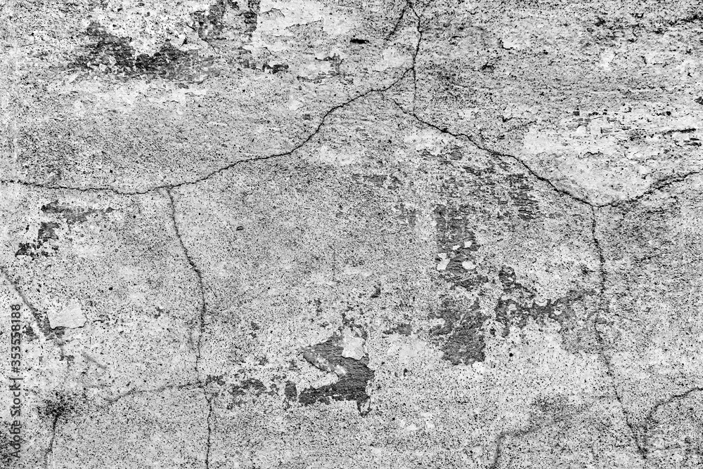 Obraz premium Texture of a concrete wall with cracks and scratches which can be used as a background