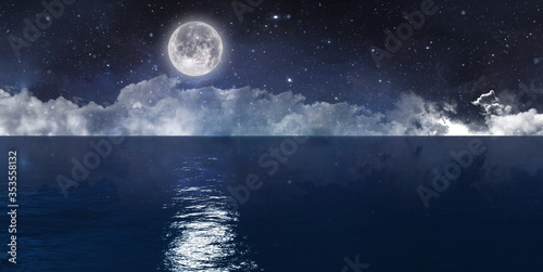 Full Moon reflecting in the water. Moonlight shinning on the sky full of stars. Great landscape with horizon. 