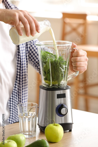 Man making healthy smoothie...