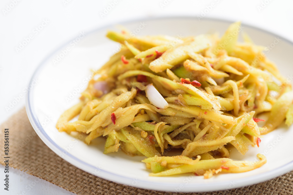 Thai food, spicy green mango salad (Tum Ma Muang)