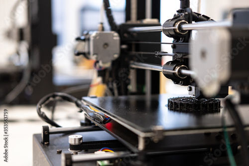 3D printer. Making plastic parts. Modern production technology.