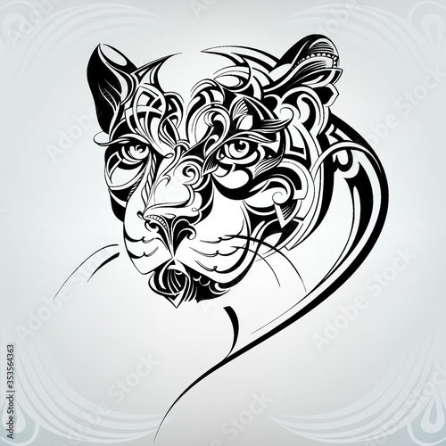 Head of a panther in a floral ornament