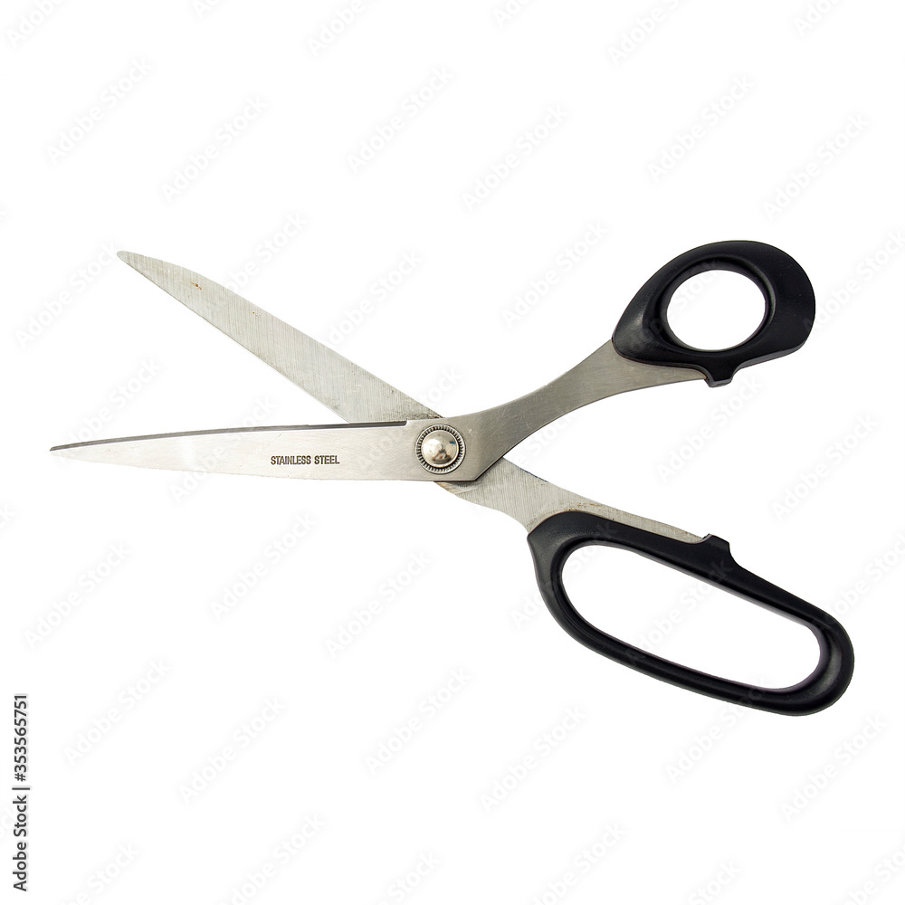 Stainless steel scissors with black handles isolated on a white background. Stainless steel scissors with black handles isolated on a white background.