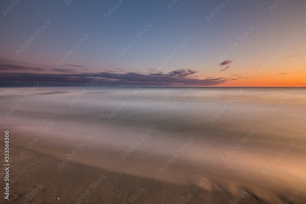Travel photography of the Baltic sea coastline.Amazing sunrise over the Sea. Jastrzebia Gora, Poland.