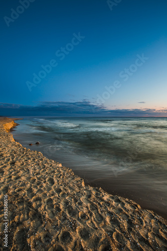 Travel photography of the Baltic sea coastline.Amazing sunrise over the Sea. Jastrzebia Gora, Poland. photo