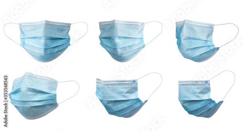 Medical face mask isolated on white background with clipping path around the face mask and the ear rope. Concept of COVID-19 or Coronavirus Disease 2019 prevention by wearing face mask. photo