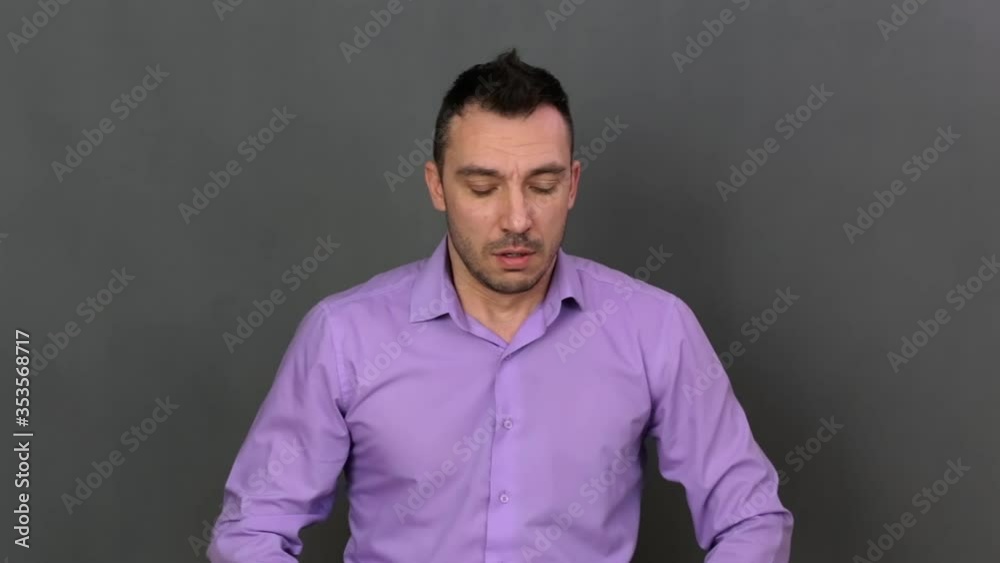 Shocked young man close-up. He shows emotions professionally. Soft light. High-quality footage FullHD. Shocked young man close-up. He shows emotions professionally. Soft light. High-quality footage FullHD.