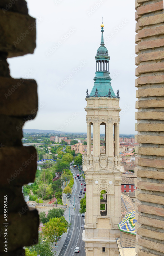 Fototapeta premium view of one of the towers of the Pilar de Zaragoza basilica in Spain
