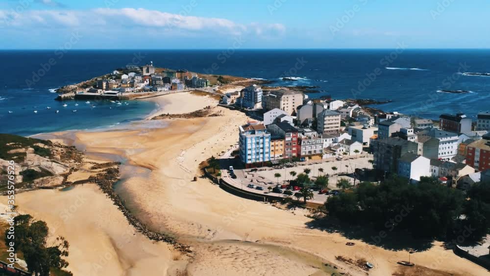 Aerial view of Beautiful beach in a sunny day. Sao Cibrao. Galicia, Spain. Drone footage Aerial view of Beautiful beach in a sunny day. Sao Cibrao. Galicia, Spain. Drone footage