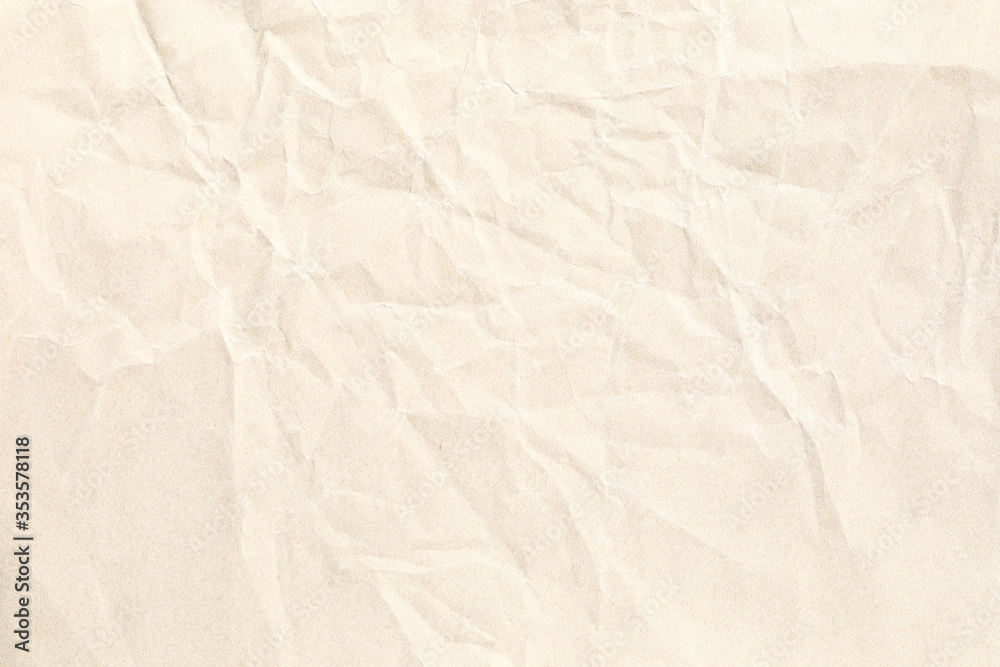 Obraz premium Old pale yellow crumpled paper background texture