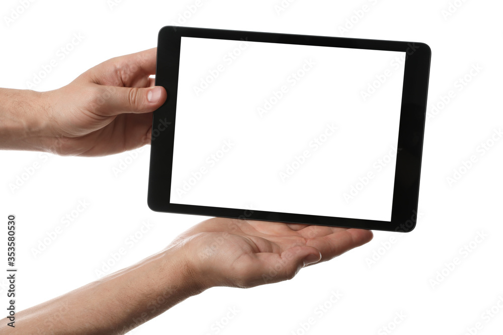 Man holding tablet computer with blank screen on white background, closeup. Modern gadget Man holding tablet computer with blank screen on white background, closeup. Modern gadget