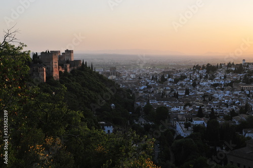 Sunset over the city of Granada  Andalusia  Spain. Alhambra palace and Albaic  n Moorish quarter