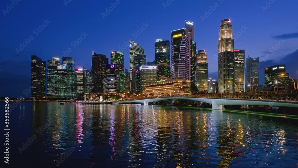 Singapore skyline and esplanade at dusk.