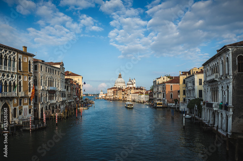 Beautiful view of famous Canal Grande and Basilica di Santa Maria della Salute in daylight  Venice  Italy