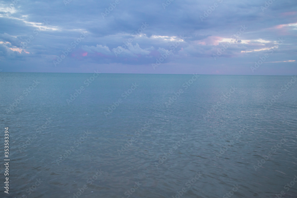 clouds over the calm sea of azov in the south of Ukraine