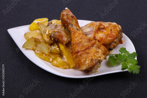 Roasted chicken legs with potato