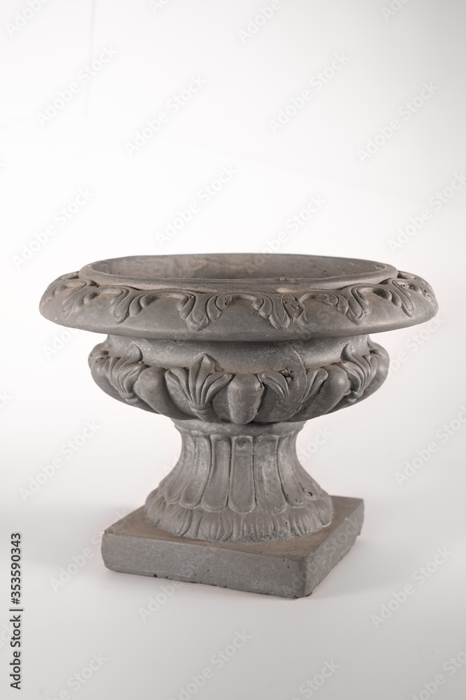 A flowerpot, flower pot, planter, plant pot. Ceramic small vase for flowers and plants A flowerpot, flower pot, planter, plant pot. Ceramic small vase for flowers and plants