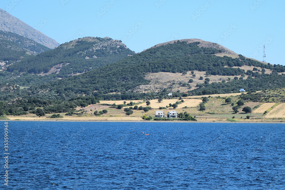 Seascape with Saos mountain and coastline Potamia area - Samothraki island view from ferry - Greece, Aegean sea
