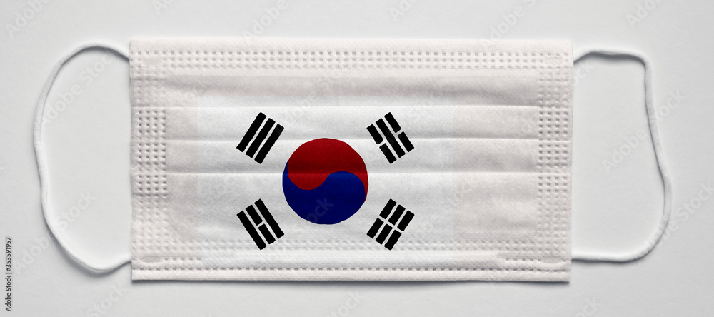 South Korea flag. Medical mask, Medical protective mask on a white background.Healthcare and medical concept.