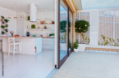 Fotografie open space kitchen with sliding doors and rooftop patio zone