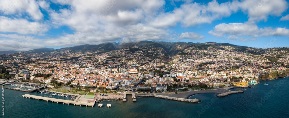 The drone panoramic view of Funchal, the capital city of Madeira island, Portugal