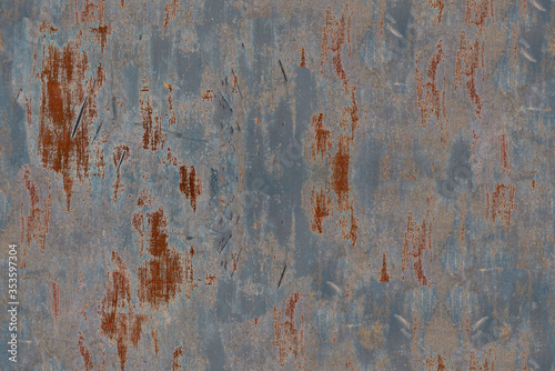 wall with old paint with scuffs and scratches gray with red spots,