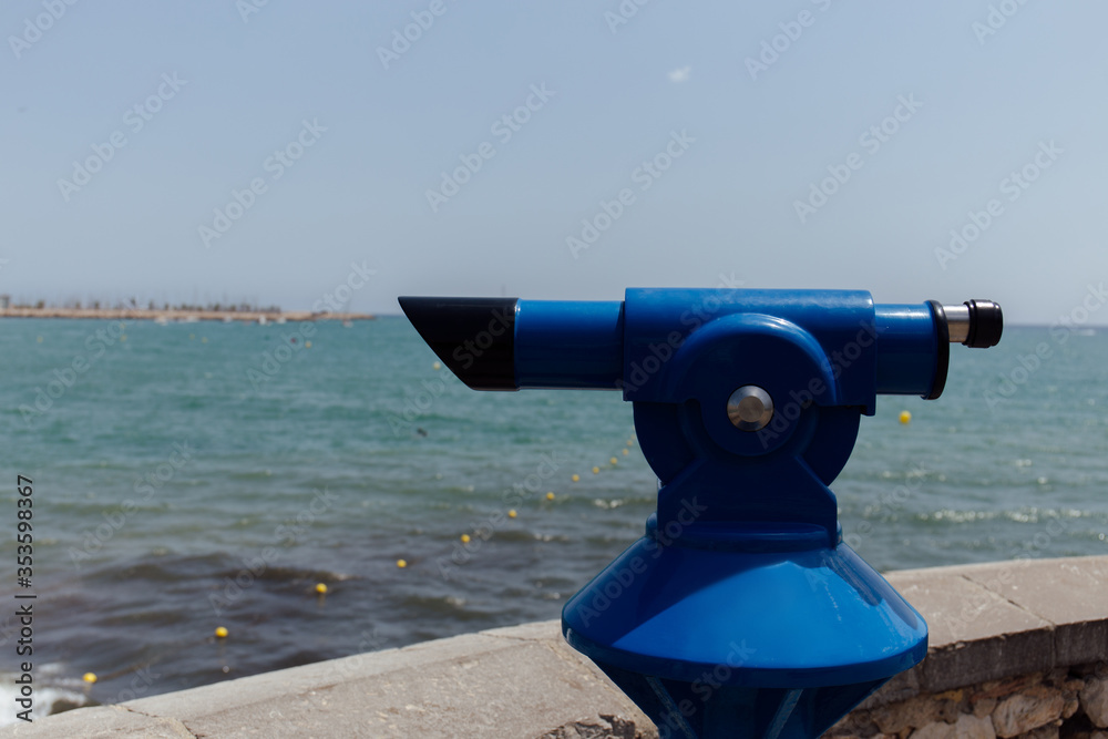 Selective focus of blue scenic viewer with sea and blue sky at background in Catalonia, Spain