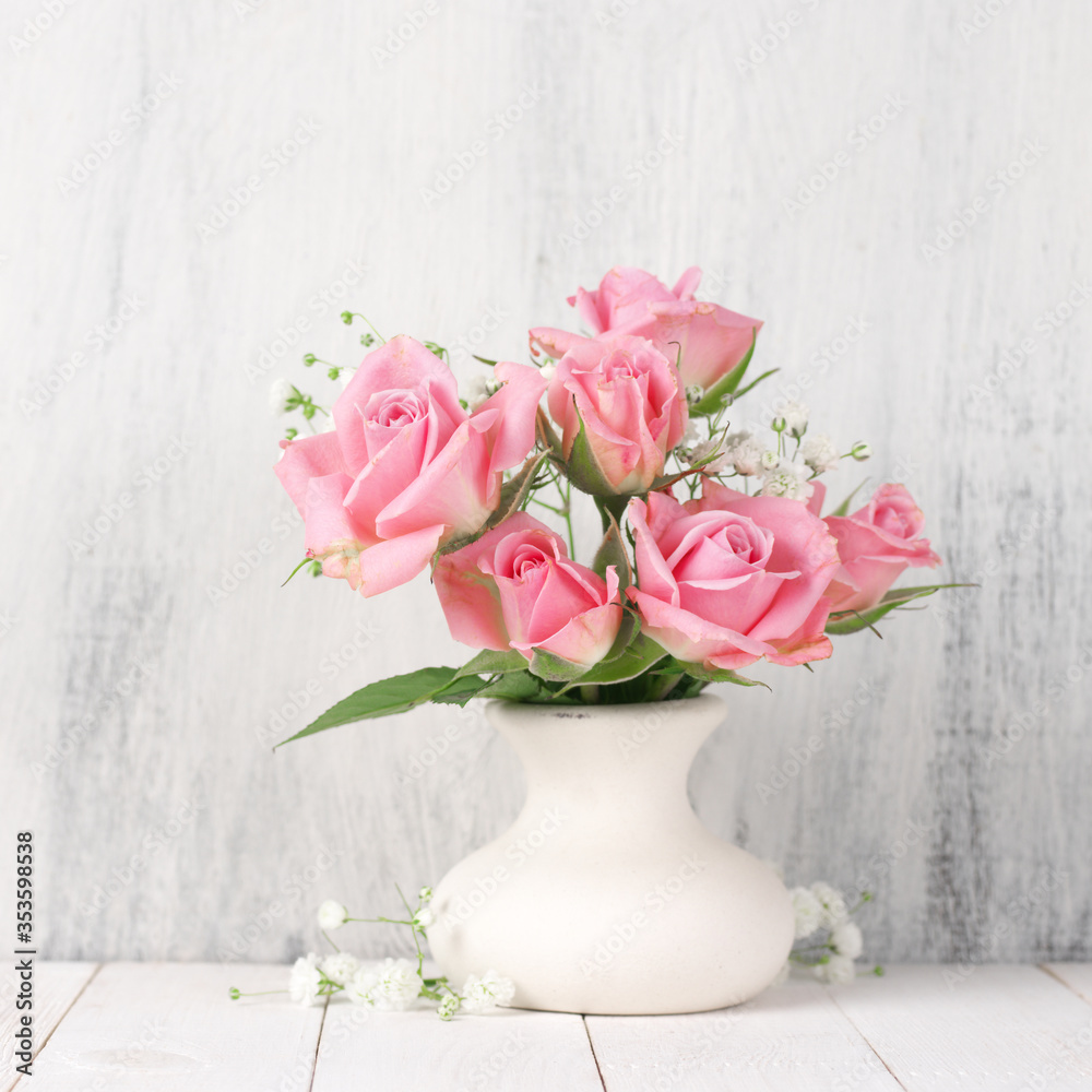Obraz premium Fresh flowers bouquet of pink roses