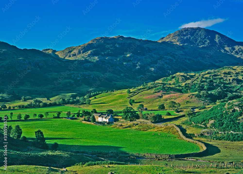 A quiet and peacful valley with farm house in the Lake District Fells