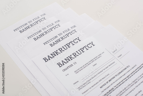 bankruptcy papers on white background with copy space © LIGHTFIELD STUDIOS