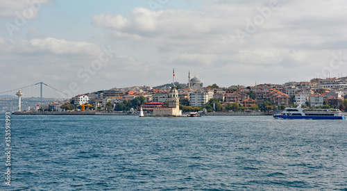 The Bosphorus waterfront of the Uskudar district on the Asian shore of Istanbul. In the centre is Maiden's Tower (AKA Leander's Tower, Tower of Leandros), & on the far left the 15 July Martyrs Bridge
