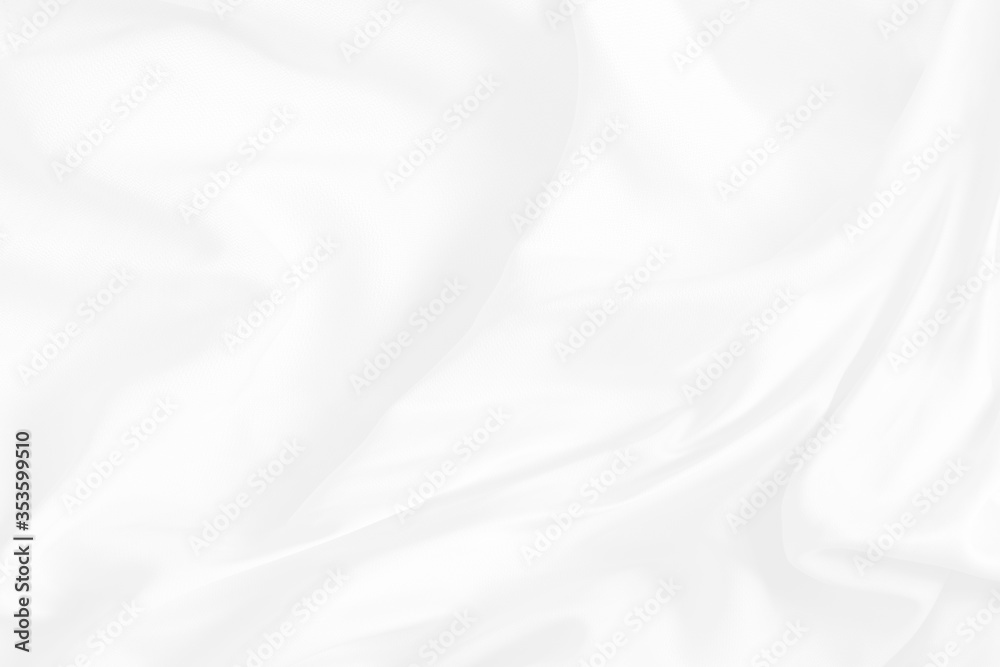 White fabric backround abstract with soft waves. Elegant and luxury silk satin texture. White fabric backround abstract with soft waves. Elegant and luxury silk satin texture.
