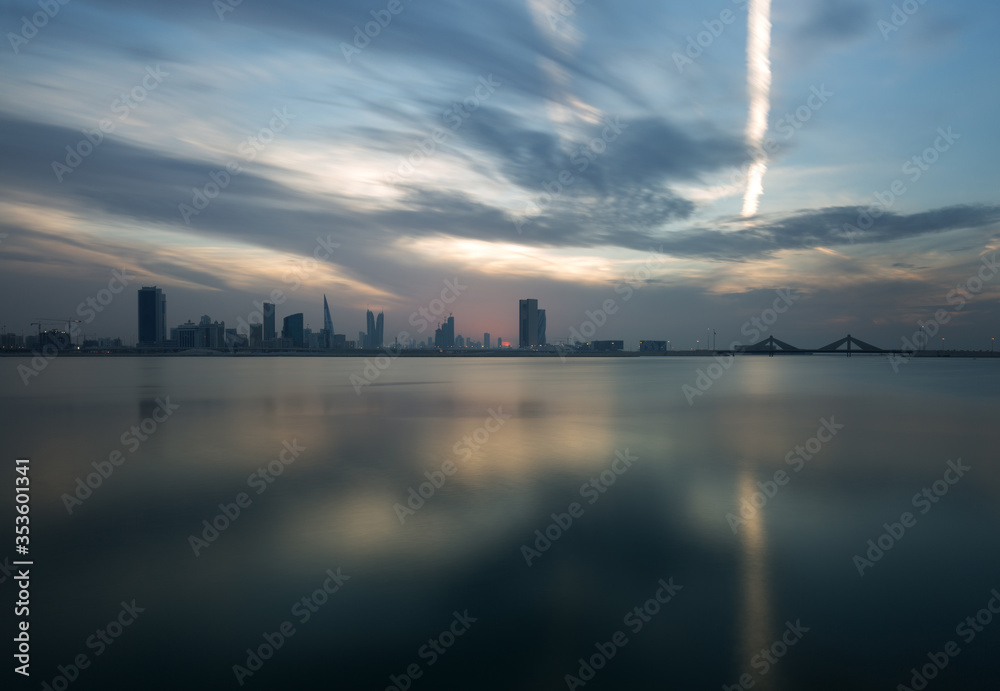Bahrain skyline at sunset with dramatic clouds