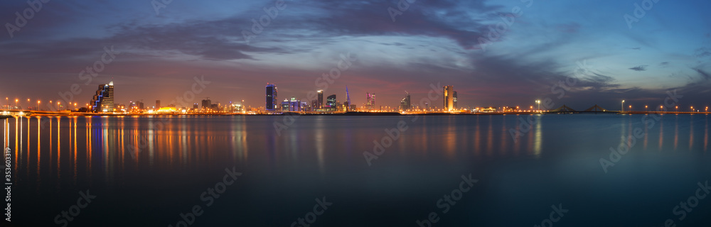 Panormic view of Bahrain skyline during blue hours after sunset