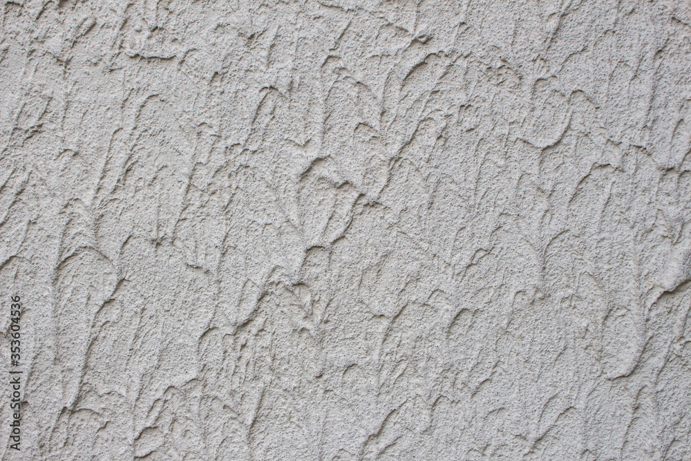 gray wall with a textured surface gray wall with a textured surface