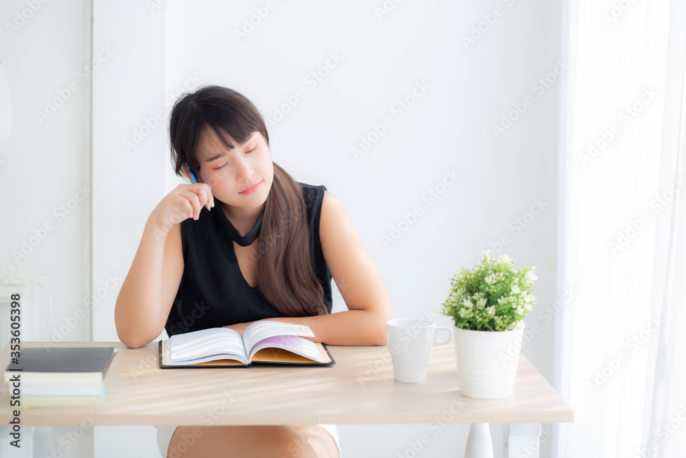 Beautiful asian woman writer thinking idea and writing on notebook or diary with happy on desk office, lifestyle of asia girl is success, female planning working, education and business concept. Beautiful asian woman writer thinking idea and writing on notebook or diary with happy on desk office, lifestyle of asia girl is success, female planning working, education and business concept.