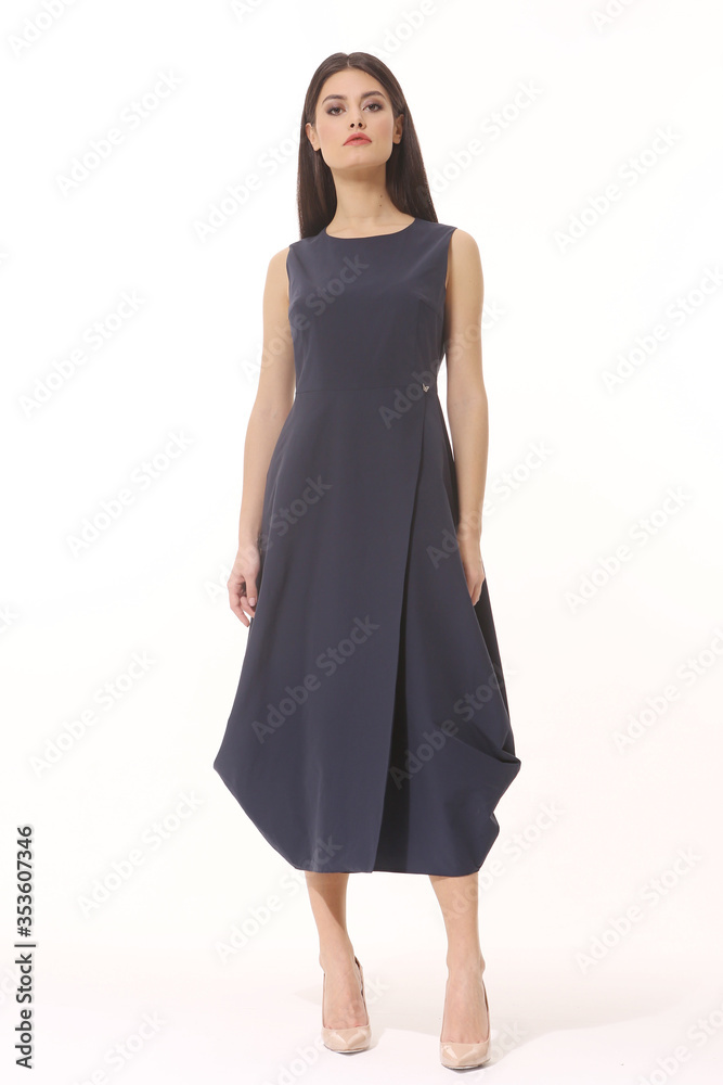 gypsy brunette business woman posing in formal short sleeve black dress gypsy brunette business woman posing in formal short sleeve black dress