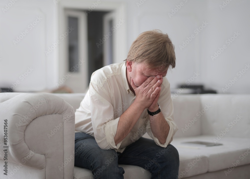 portrait of a despair man at home portrait of a despair man at home