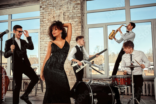 Photography Young international musicians, a band performing on the loft stage