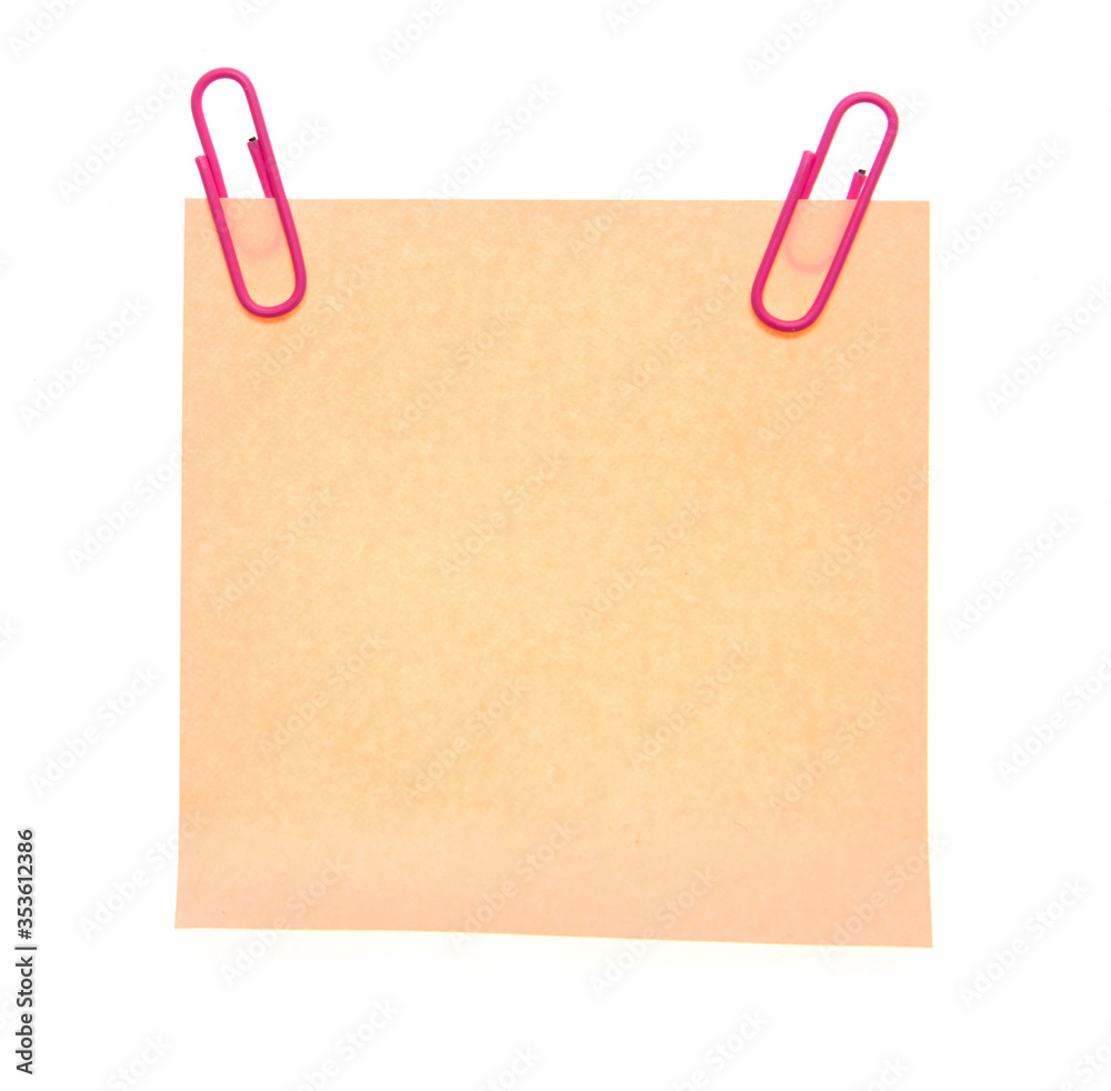 Paper with paper clips on a white background. Paper with paper clips on a white background.