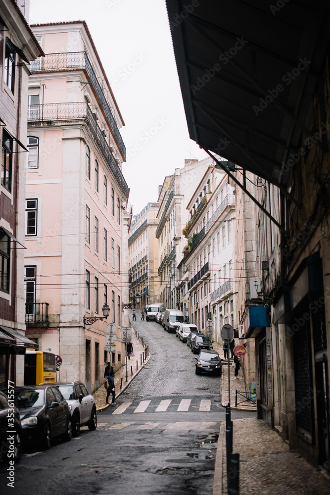 Lisbon/Portugal-06.11.2019: Streets of moody Lisbon, vertical photo