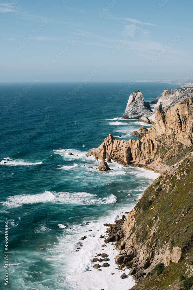 Deserted hidden sunset wild Ursa beach in Portugal, near Cape Roca