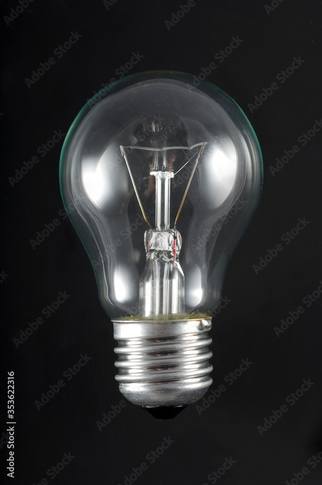 light bulb on a black background light bulb on a black background