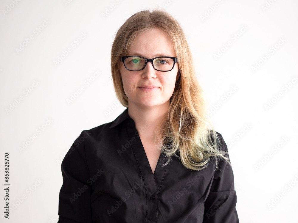 portrait of an office worker in a black shirt and glasses portrait of an office worker in a black shirt and glasses