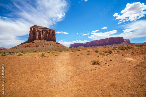 hiking the wildcat trail in the monument valley, usa