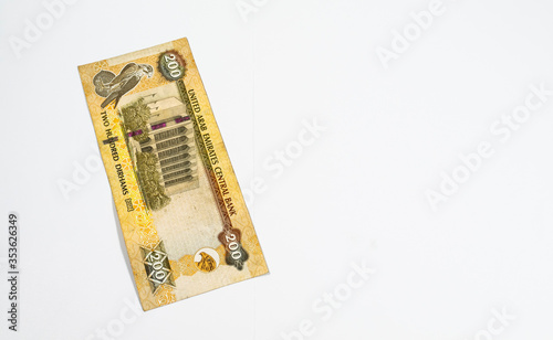 A close up view of United Arab Emirates currency, with white background, UAE Dirhams