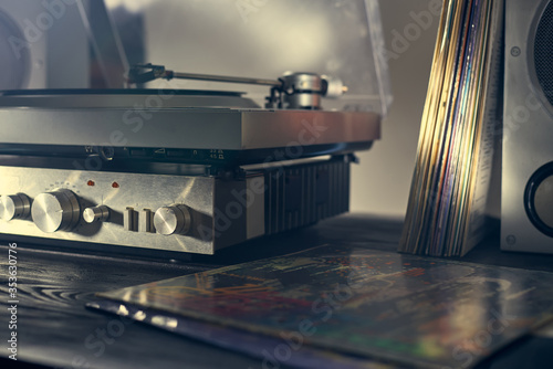 Music amplifier for vinyl player, turntables. Old school. musical atmosphere. Old player and analog music. pile of plates
