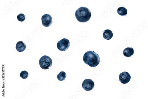 Fototapeta Naklejka Na Ścianę i Meble -  Falling blueberry, isolated on white background. Flat lay. Food concept.
