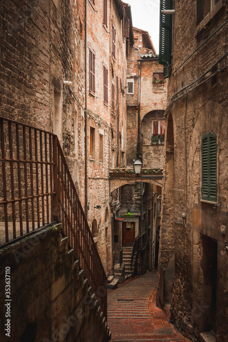 a picturesque alley in the city of Perugia leads to the city center